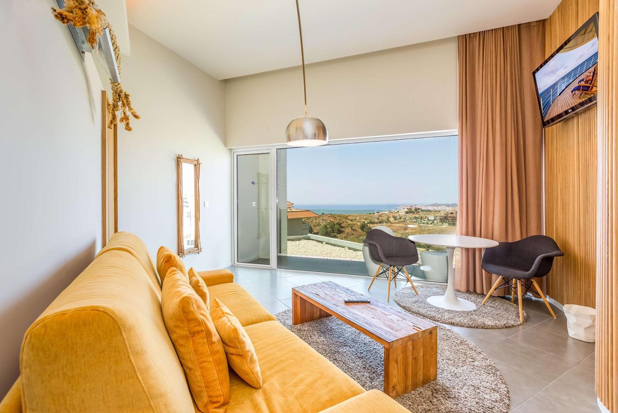 Higueron Hotel Curio Collection By Hilton (Adults Only) Fuengirola Exterior photo A living room in a hotel